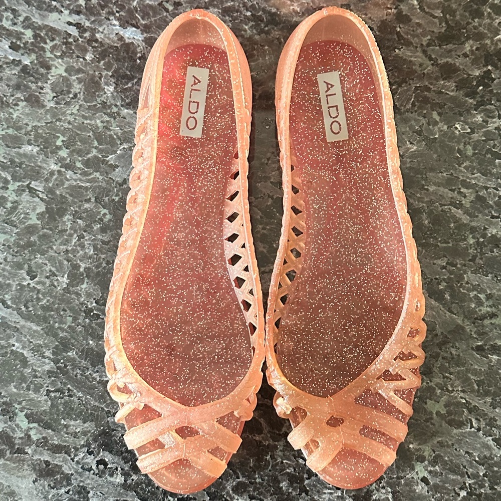 ALDO pink sparkle jelly flats. Says size 6 but they fit more like an 8- 81/2.